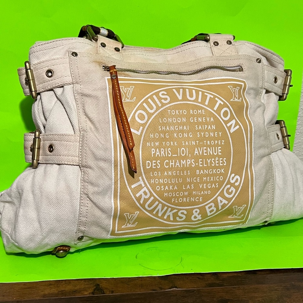 Damaged Beige Canvas Trunks & Bags Tote